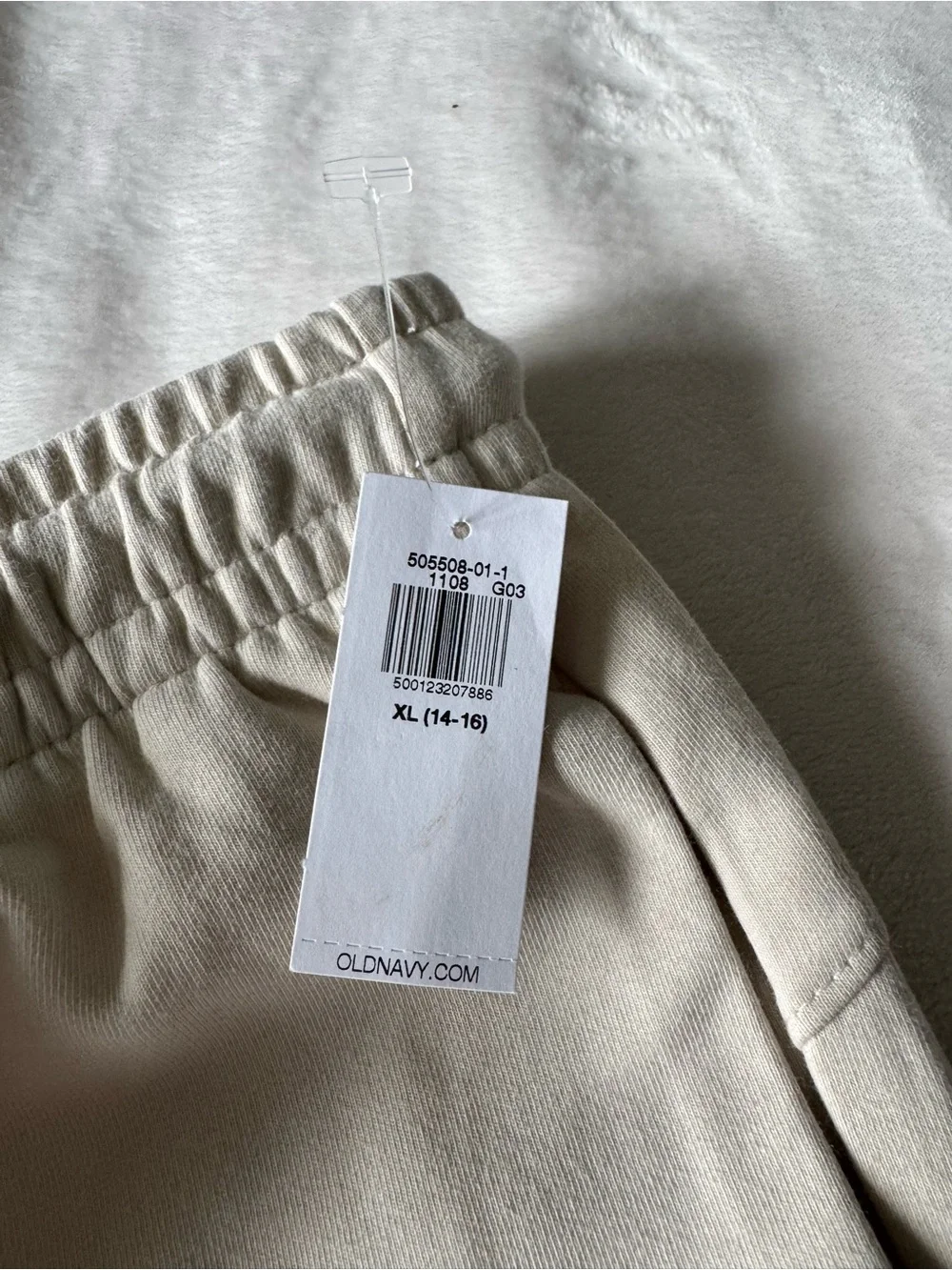 Old Navy Cream Fleece Joggers with White Pocket Lining